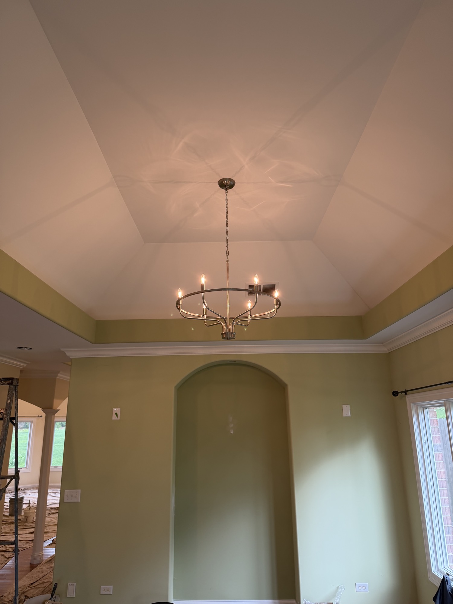 Chandelier on a vaulted ceiling